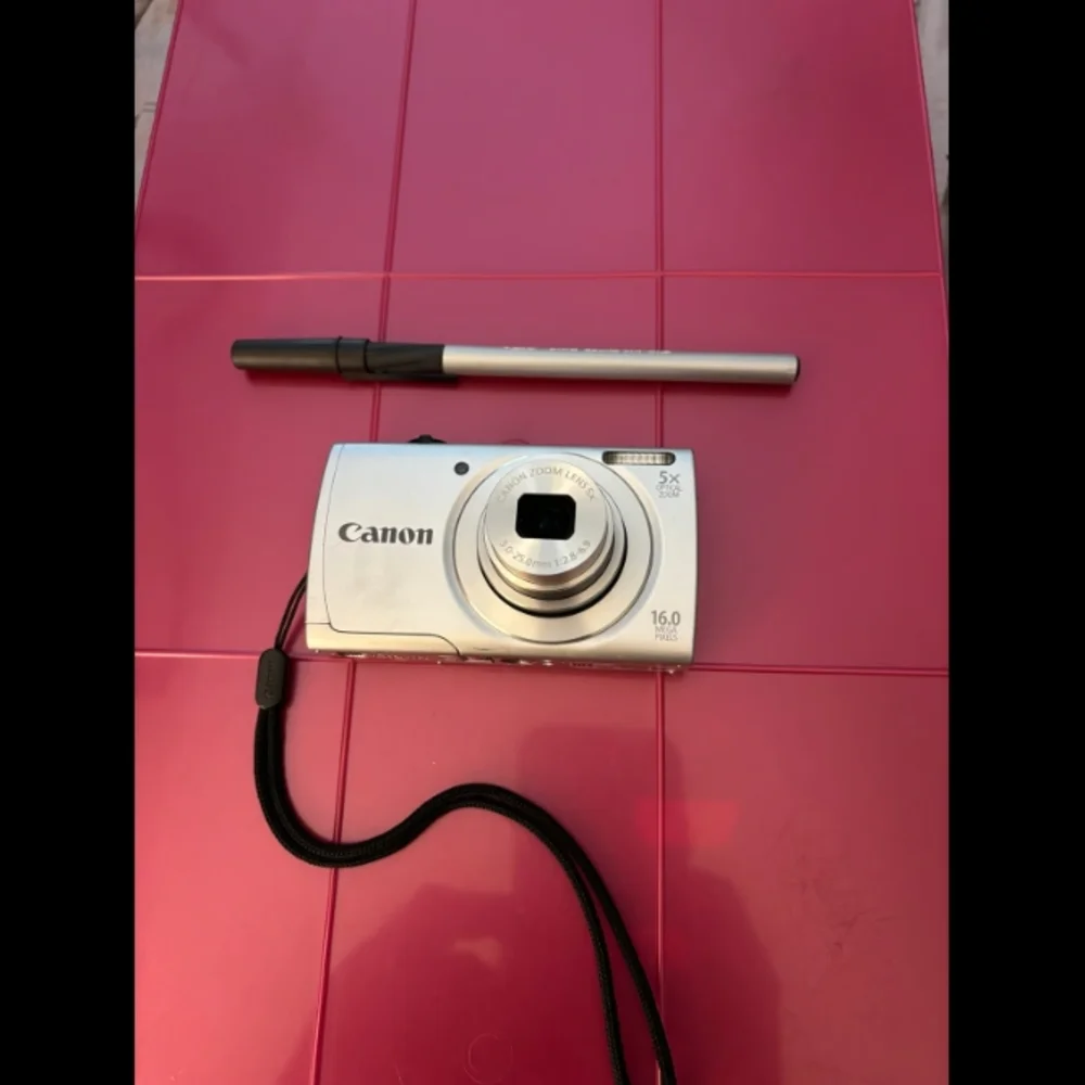 Canon Silver Digital Camera with Black Case
